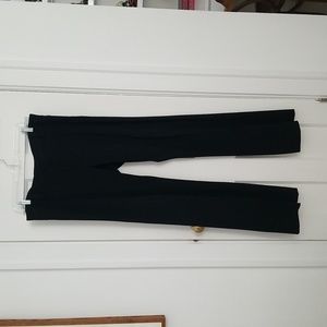 DKNY high waisted, heel length, long trousers. Size 14. Nice fabric.